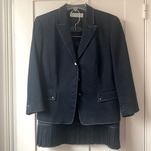 Tahari blue skirt suit with logo button details and pleated hem skirt. Size 10.